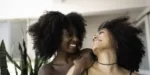 two-young-women-of-color-smiling-at-each-other Silvermist young adult drug and alcohol rehab