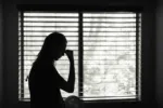 stressed-young-woman-in-the-bedroom-stockpack-istock