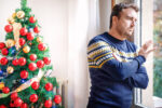 Man suffering negative emotions during christmas day