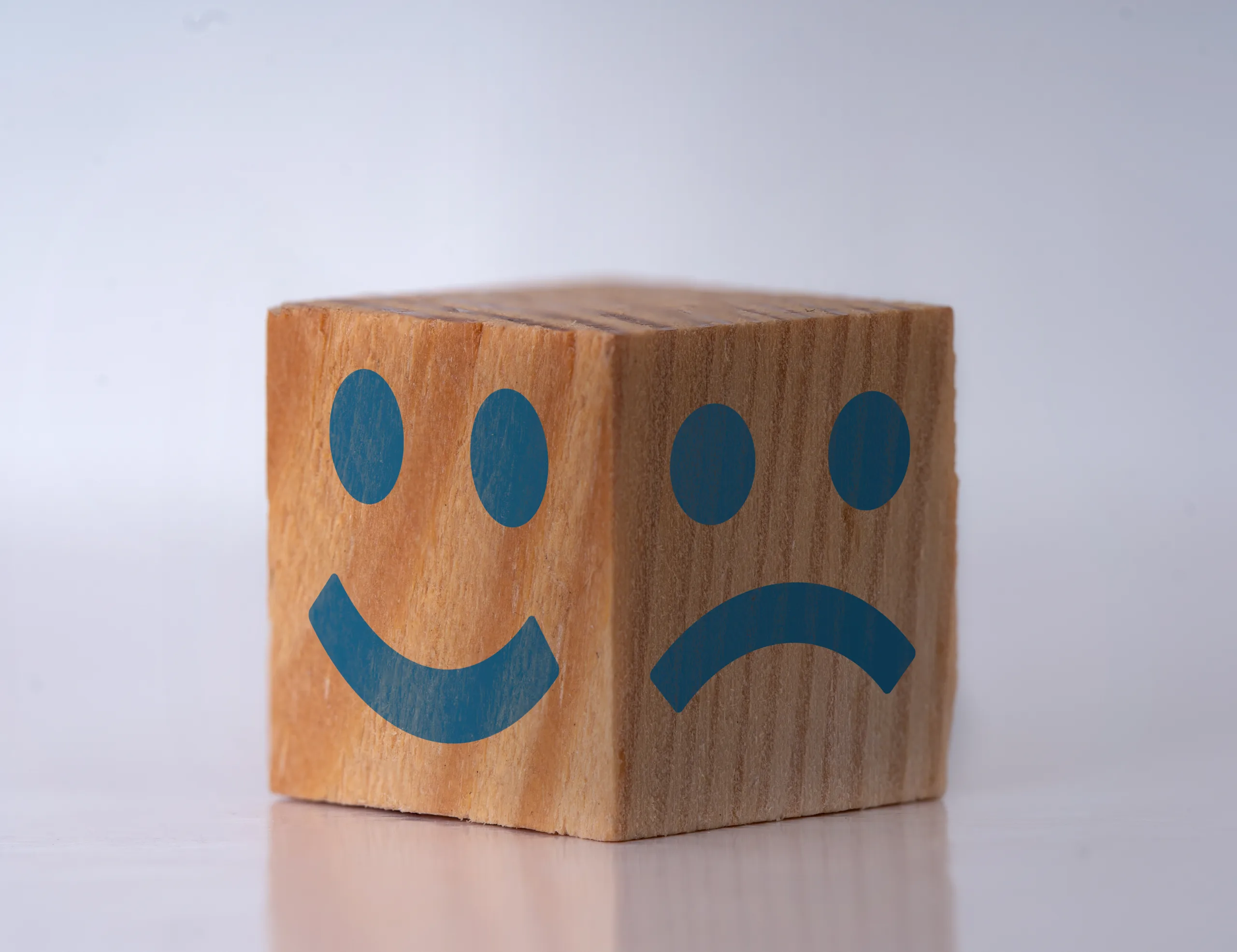 Portrait of a man with tree different emotional face expressions as a symbol of instant personality shifts. Concept of bipolar and borderline.