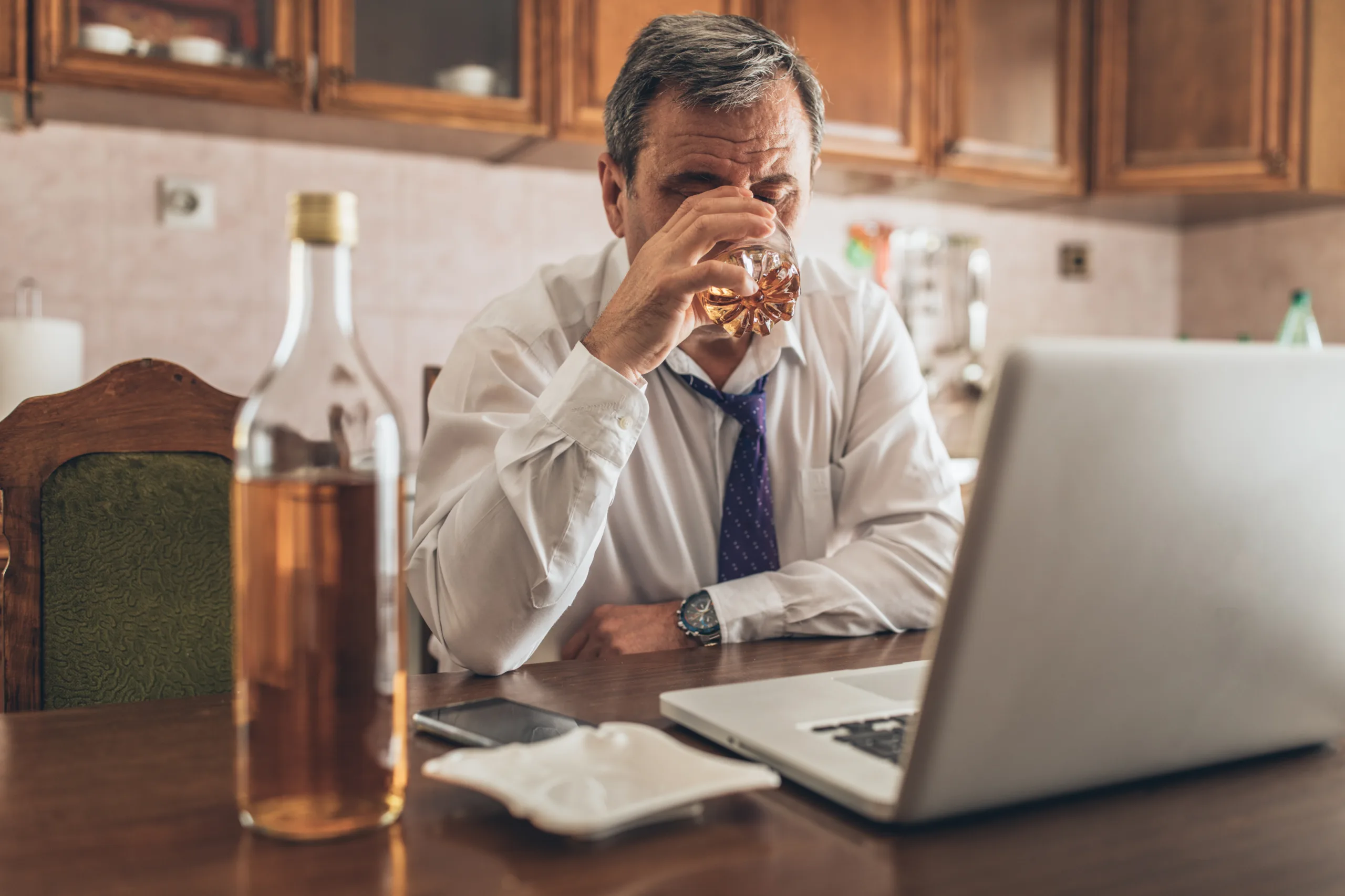 Businessman working long hours at home